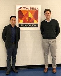 Chang (left) being welcomed to Birla by Lewis (right) on his first day.