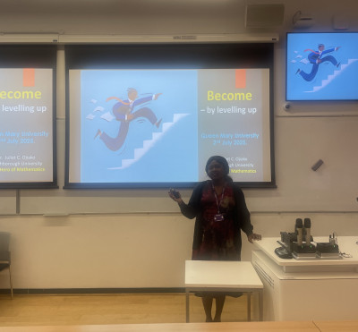 click/tap to enlarge this image... Dr Juliet Ojiako delivering her talk