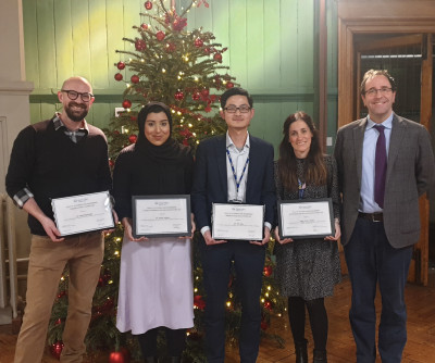 SEMS staff recognised at the awards were from left to right: Paul, Sanaa, Wei and Irene all being congratulated by James Busfield.