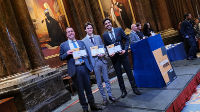 click/tap to enlarge this image... From left to right (James Busfield, Max Kemper and Rehan Shah) with their Award at the QMSU Celebration