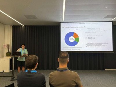 click/tap to enlarge this image... Yinghao Qin presenting the research
