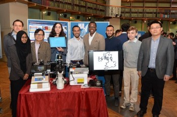 The MEng group and two of their supervisors with their demonstration