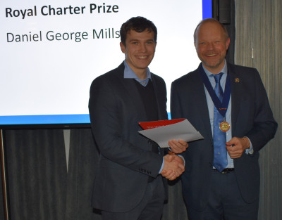 Daniel receiving his Royal Charter Award at the IOM3