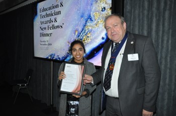 Ruhi being awarded the RH Craven Award by the IOM3 President Martin Cox