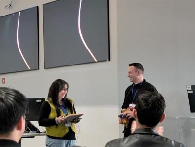 Dr Giuseppe Viola collecting the BCUR baton at the closing ceremony.