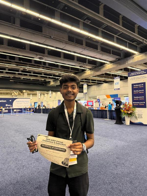 click/tap to enlarge this image... Ilan with his certificate at the ASEE conference