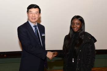 click/tap to enlarge this image... Prof Wen Wang (Head of School) congratulates Philomena on her project poster competition win.