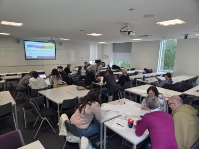 Dr Shah guiding participants through assessment design tasks