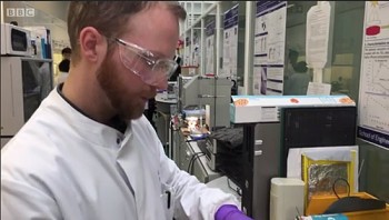 click/tap to enlarge this image... Dr Joe Briscoe shows how the piezomaterial material is made in the lab
