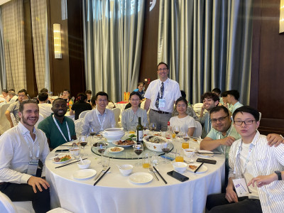 Five students the SMG plus James and two former group members Leihao Chen and Yinping Tao (and one of Yinping's students) at the IRC 2023 conference banquet in China.