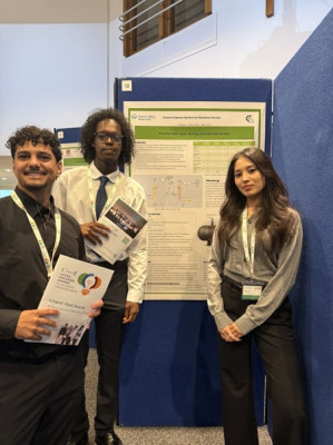 click/tap to enlarge this image... Group of Chemical Engineering students presenting their poster at YEAIS