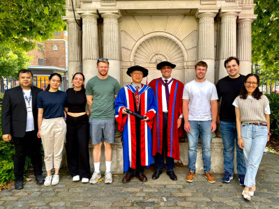 click/tap to enlarge this image... Keizo after the ceremony in the centre with some of the Soft Matter Group (from left to right, Rattapong, Thao, Sarah, Max, Keizo, James, Orkid, Aaron and Maria)