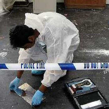 Student performing electrostatic lifting of a shoe mark