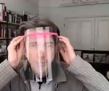 A protective visor using a 3D printed frame.