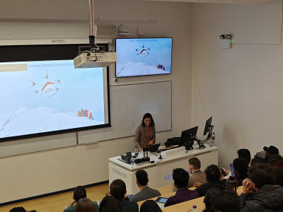 click/tap to enlarge this image... The speaker engaging with students