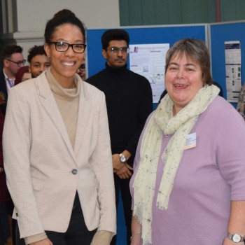 Moresche being congratulated by Dr Carolyn Small, the Chair of the Materials Division Industrial Advisory Board from Arconic