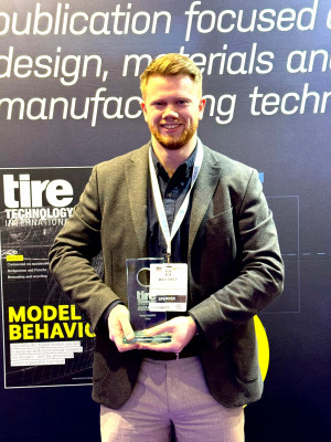 click/tap to enlarge this image... Max with his award at the prize ceremony