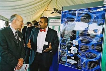 click/tap to enlarge this image... Lord Haskel visits Suwan to learns more about his research and the poster entitled ' A Novel Method of Forming Porous Ceramic Structures'