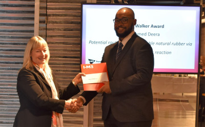 Mohammed Deera receiving the award from Prof Serena Best