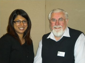 Professor Colin Webb MBE FRS presents the award to Farah Ahmed