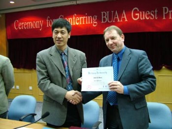 Paul receiving Guest Prof Award from Huibin Xu
