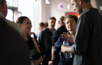 People mingling at a Queen Mary event