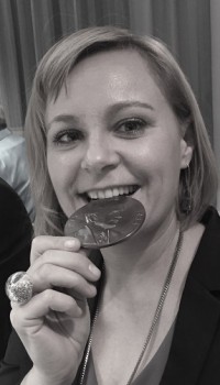 Madga checking out her medal at the gala dinner