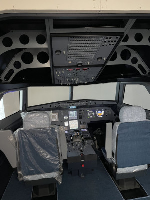 Two students can sit in the simulator