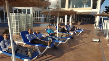 click/tap to enlarge this image... After the victory the QMUL team is seen relaxing in Spain.