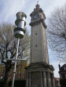 The portable wind turbine, seen here outside the Queens' buliding, stands tall at 4m
