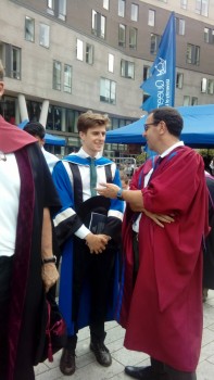 David (in blue) is pictured here with James Busfield after the ceremony