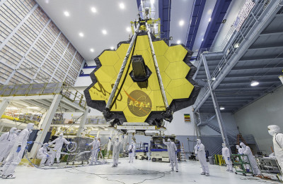 click/tap to enlarge this image... James Webb Space Telescope's 18-segmented gold mirror, designed to capture infrared light - Photo credit: NASA