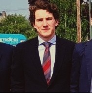 Antonio in a shirt, tie and blazer