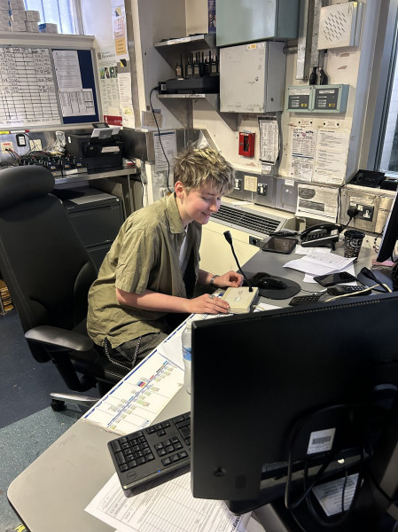 Lewis reading his poem over the tannoy at Charing Cross Station