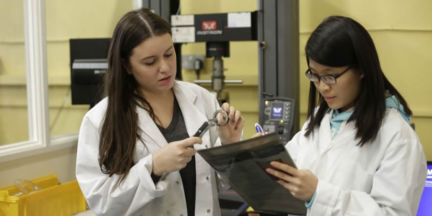 researchers in lab