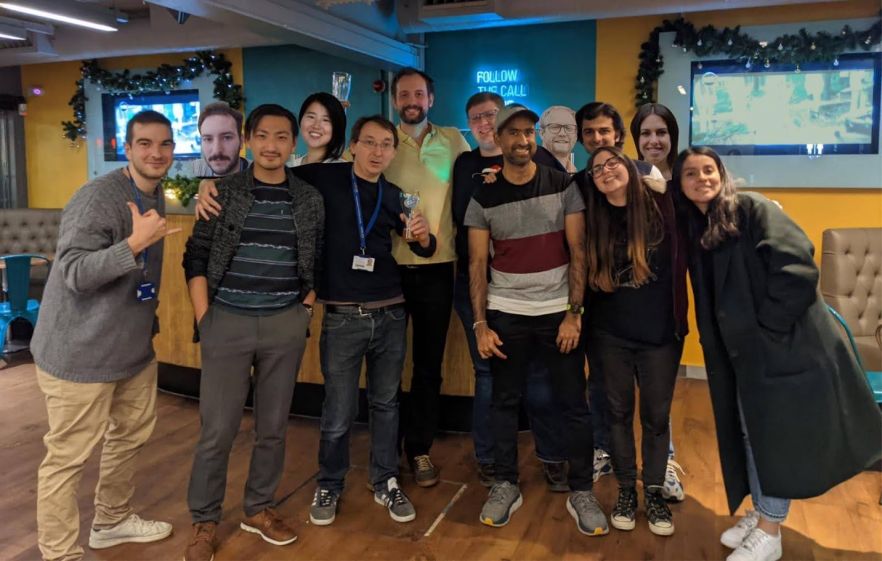 A group of Robotics Engineering PhD students and staff